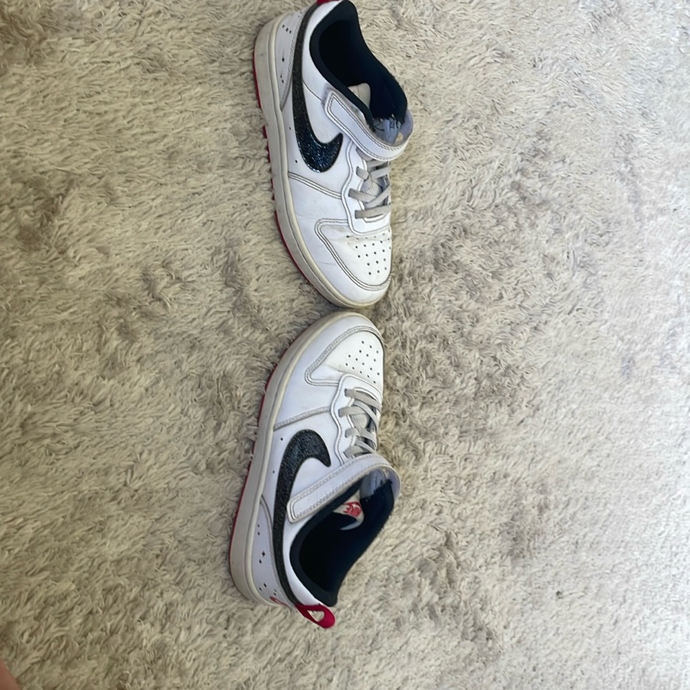 Black red and white kids nike shoes.       Cute, aesthetic.